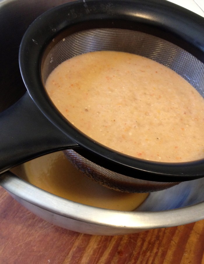 straining melon tomato gazpacho