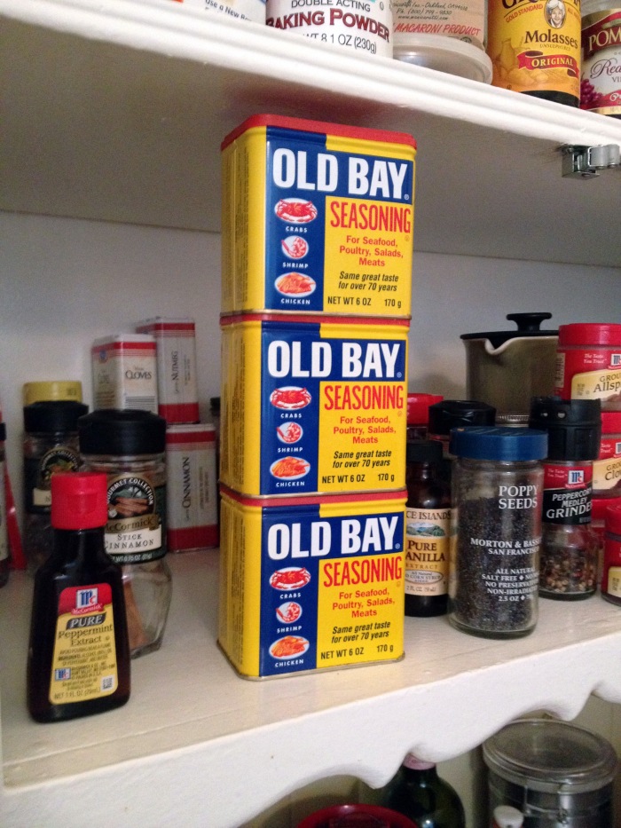 Three cans of Old Bay