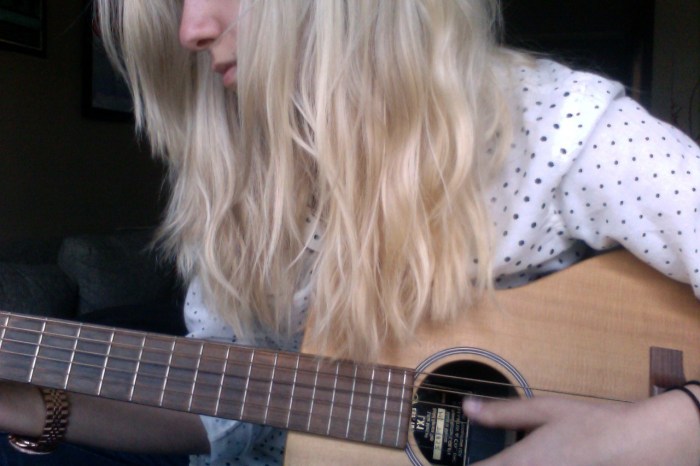 practicing guitar