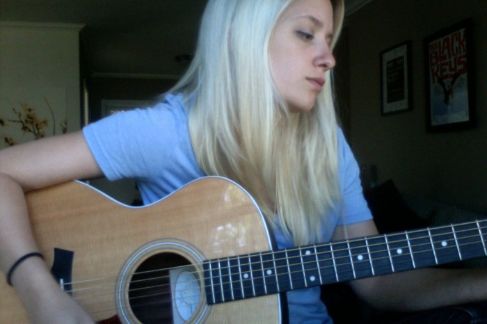 blue shirt with taylor guitar